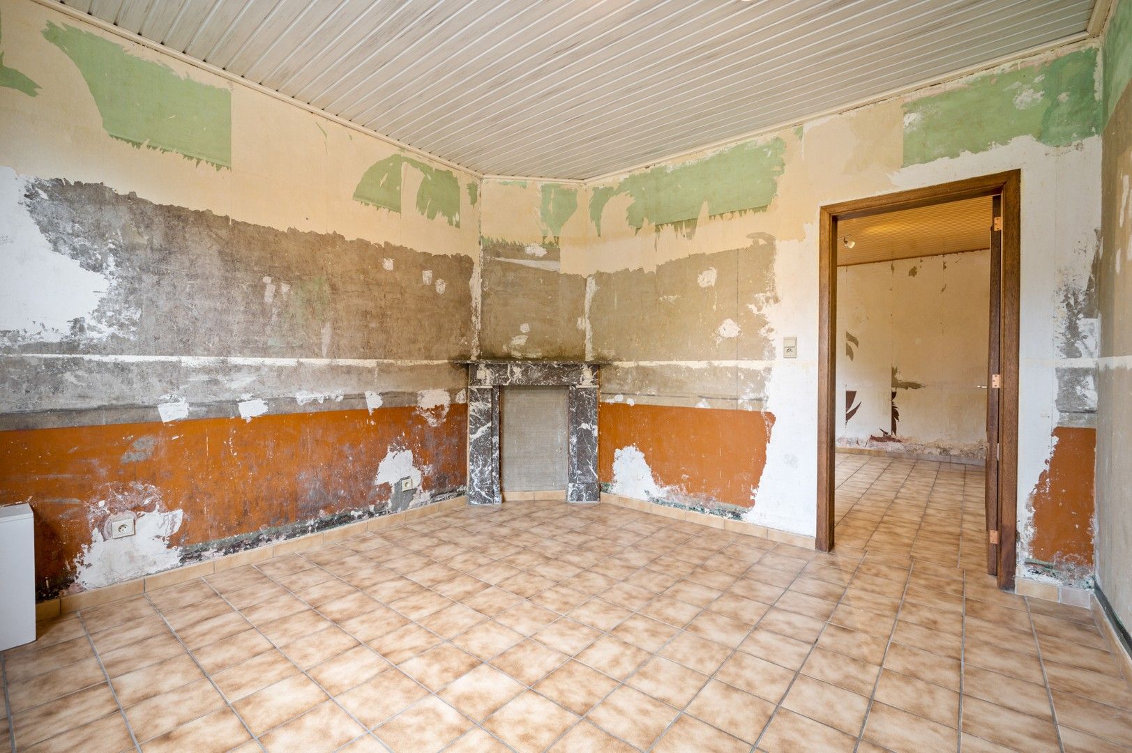 Te renoveren woning met tuin en garage in Wolfsdonk! foto 4