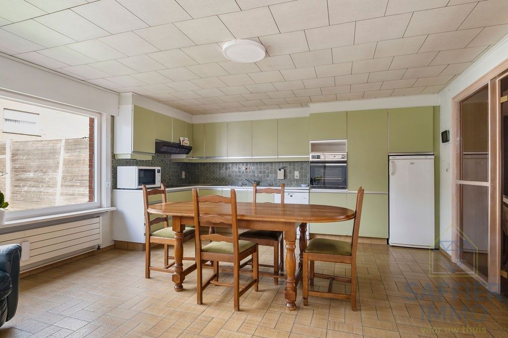 Ruime woning zonder renovatieplicht in de Seizoenswijk te Kuurne foto 15