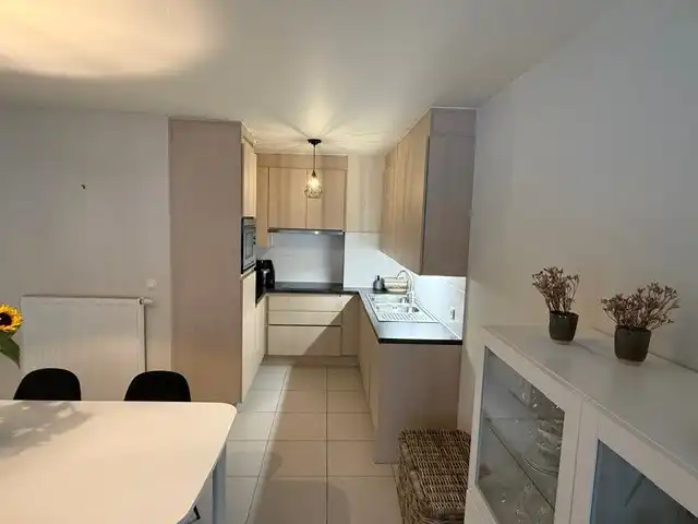 Ruim en toegankelijk 2-slaapkamerappartement met terras in Waregem foto 10