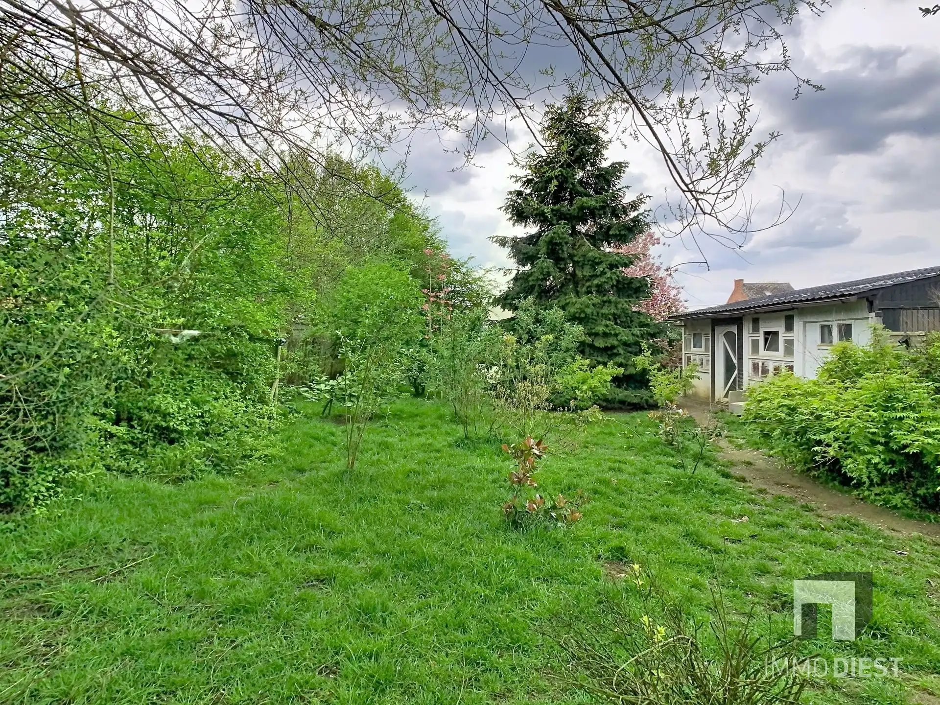 Charmante, op te frissen woning met ruime tuin nabij het centrum van Herselt. foto 34