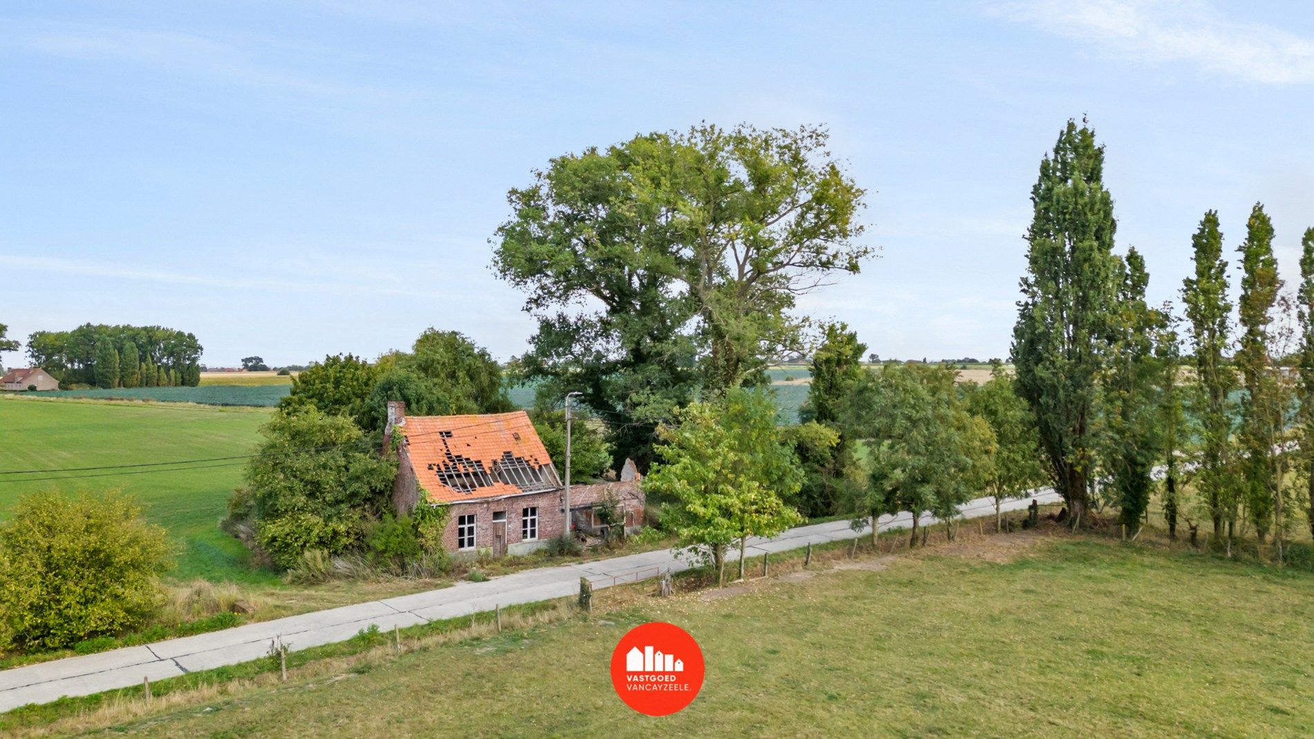 Hoofdfoto van de publicatie: Perceel bouwgrond op rustige ligging in Boezinge met open zicht over de velden. 