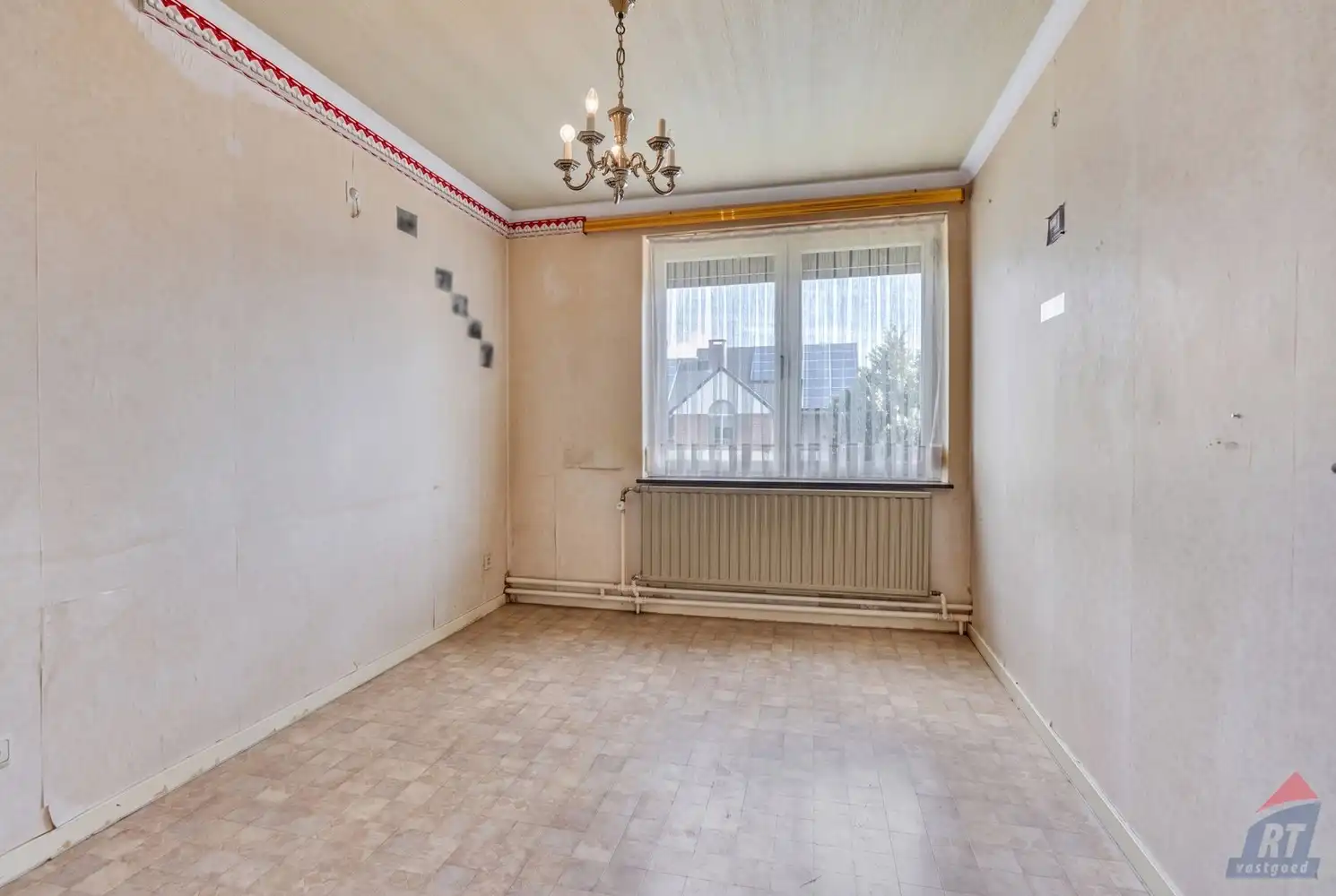 Rustig gelegen, op te frissen woning in Alken foto 17