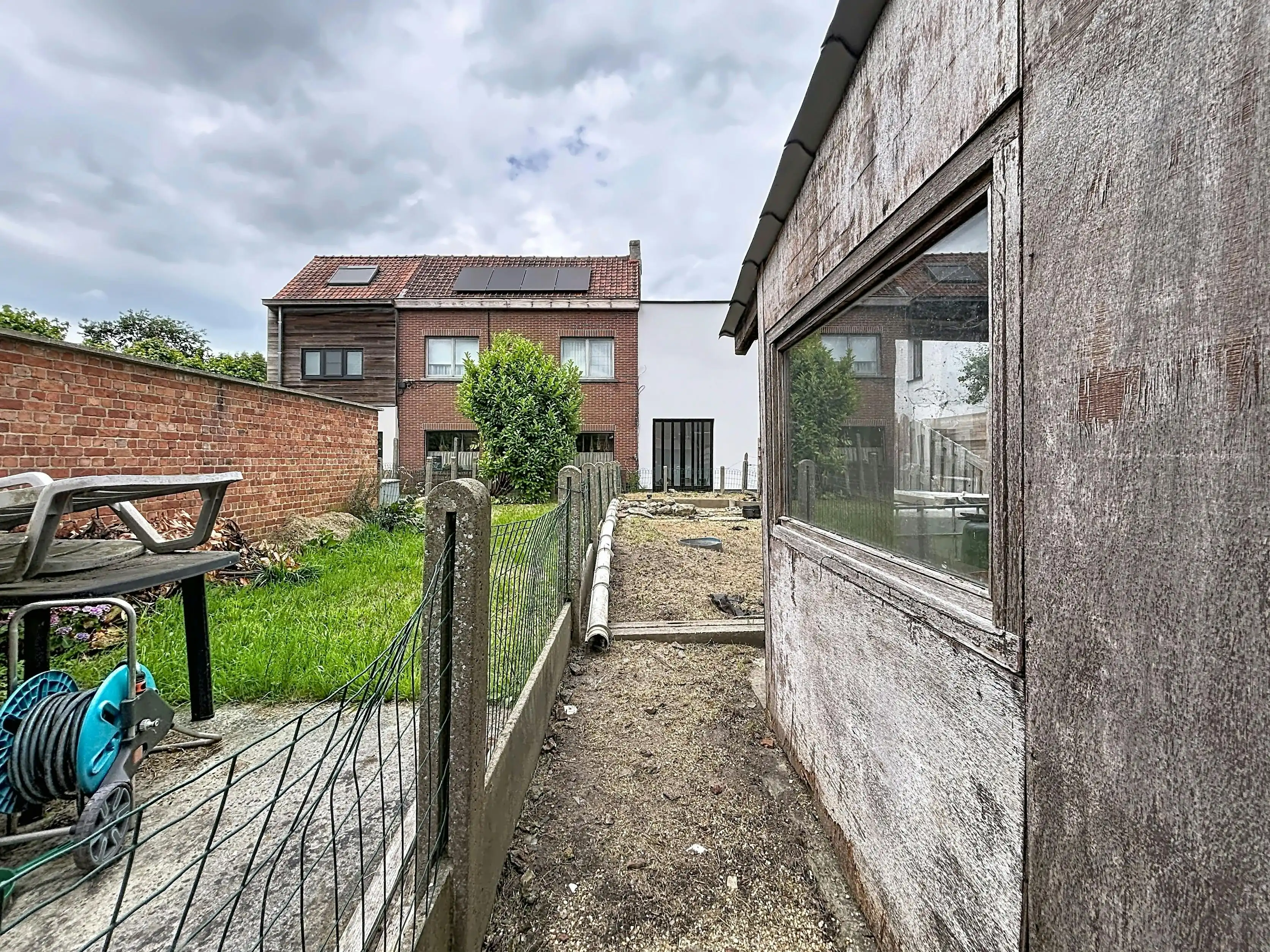 Te renoveren woning met tuin in Deinze foto 11