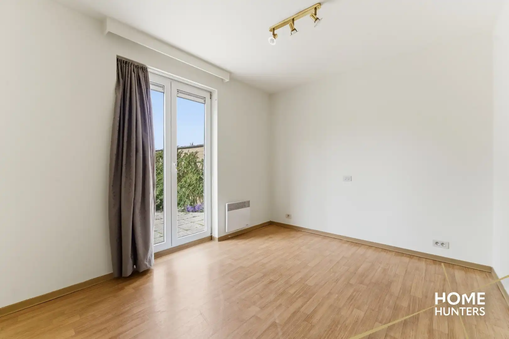 Instapklaar gelijkvloers appartement met 2 slaapkamers en ruime tuin foto 19