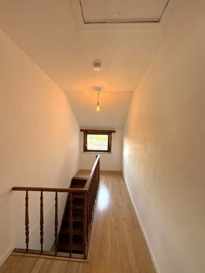 Instapklare woning met 2 slaapkamers en ruime binnenplaats in Menen foto 10