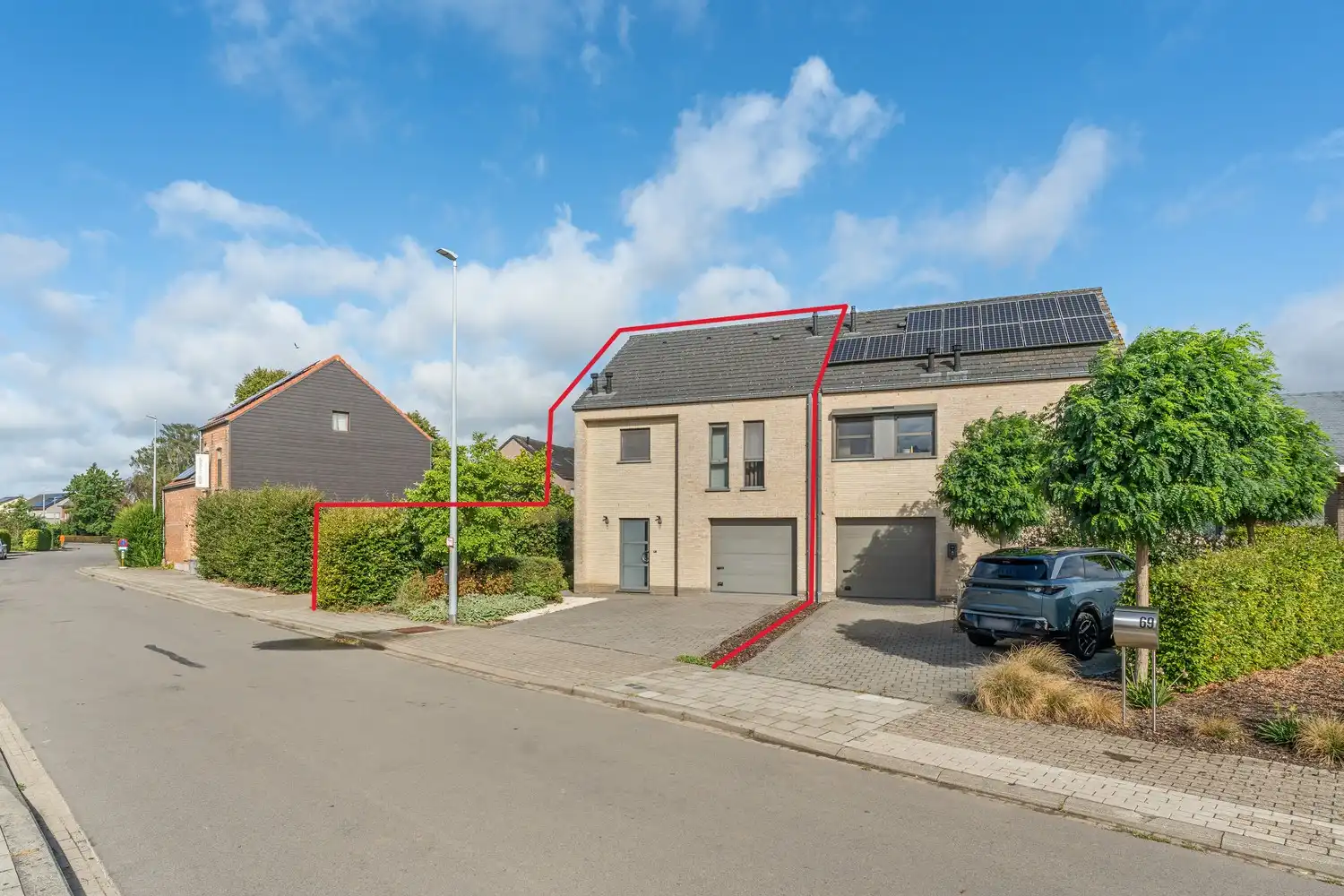 Ruime en energiezuinige halfopen bebouwing met 4 slaapkamers in Wilsele foto {{pictureIndex}}