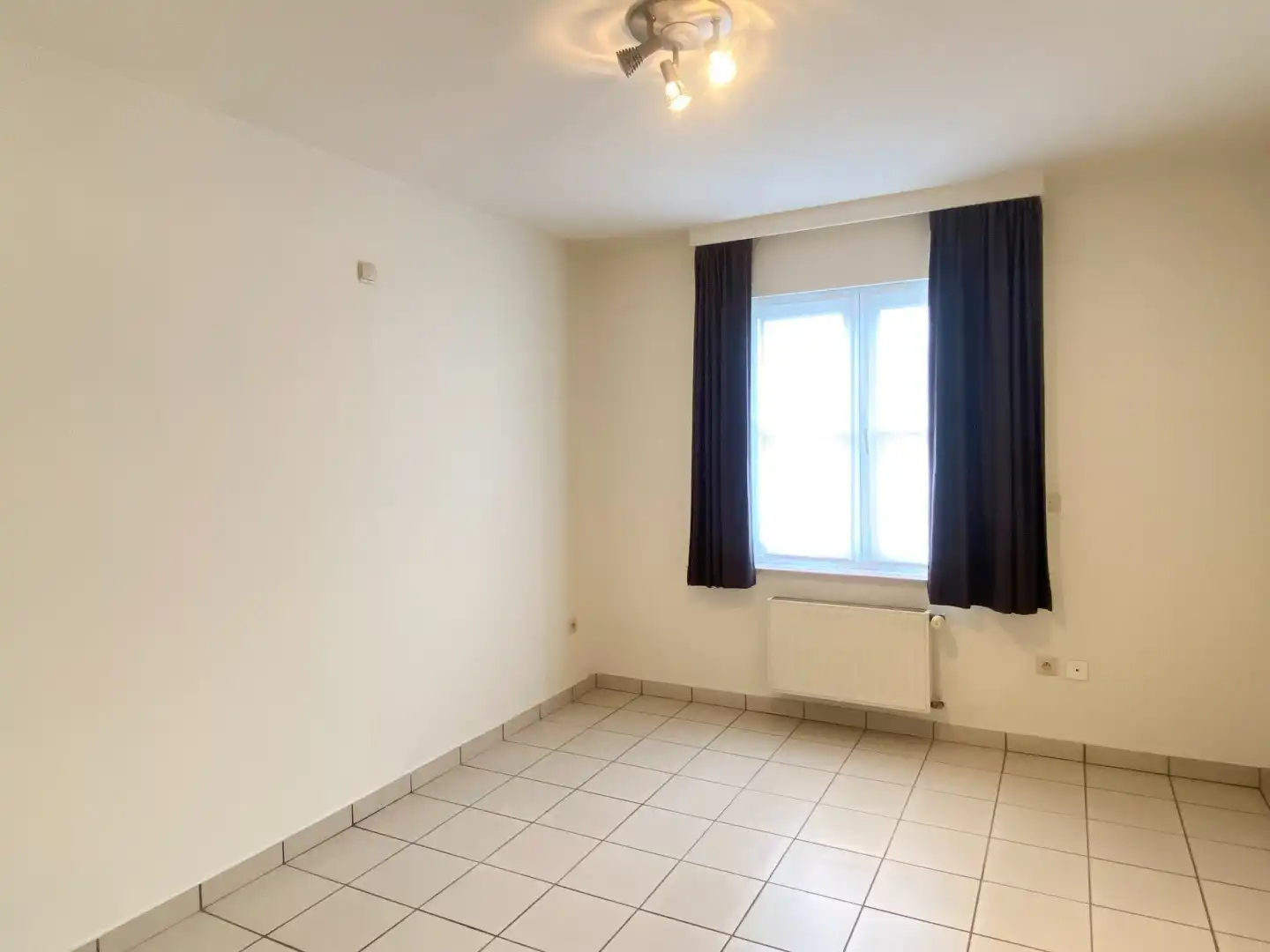 LICHTRIJK APPARTEMENT MET 2 SLAAPKAMERS EN GARAGE foto 9