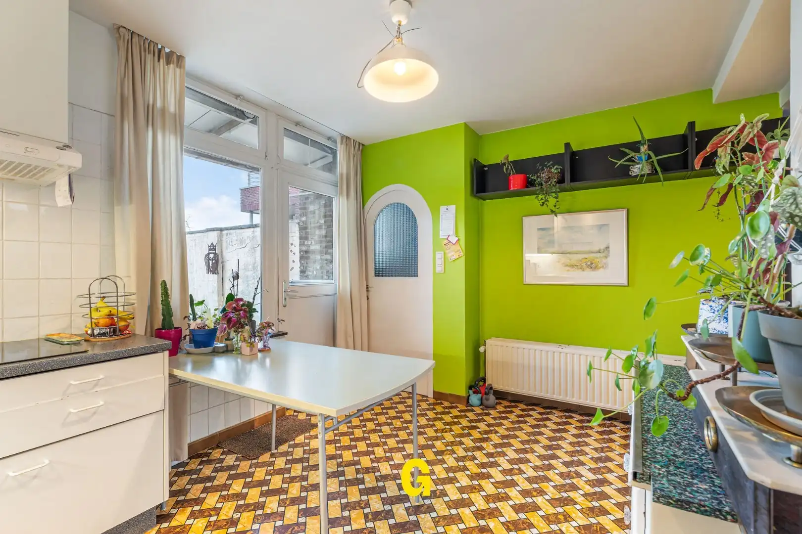 Leuke rijwoning met karakter, 3 slaapkamers, uitbreidingsmogelijkheden op zolder en gezellig tuintje met carport bereikbaar langs achter. foto 11