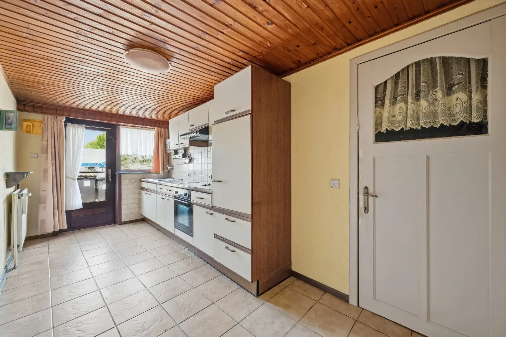 Te renoveren rijwoning in Attenhoven met tuin, garage en 3 slaapkamers foto 12
