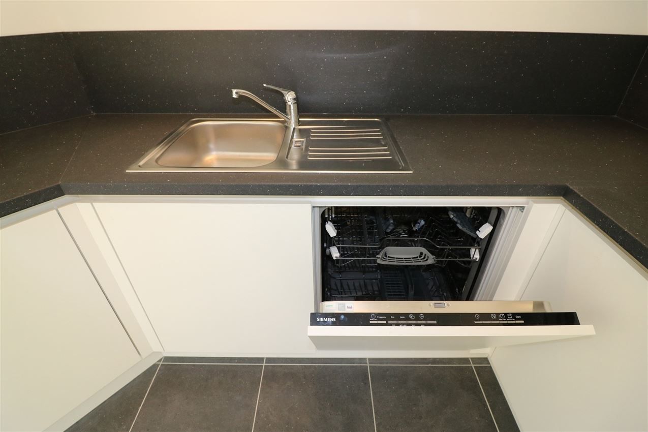 Bijzonder opgevat penthouse, 2 slpk., garage, groot terras foto 11