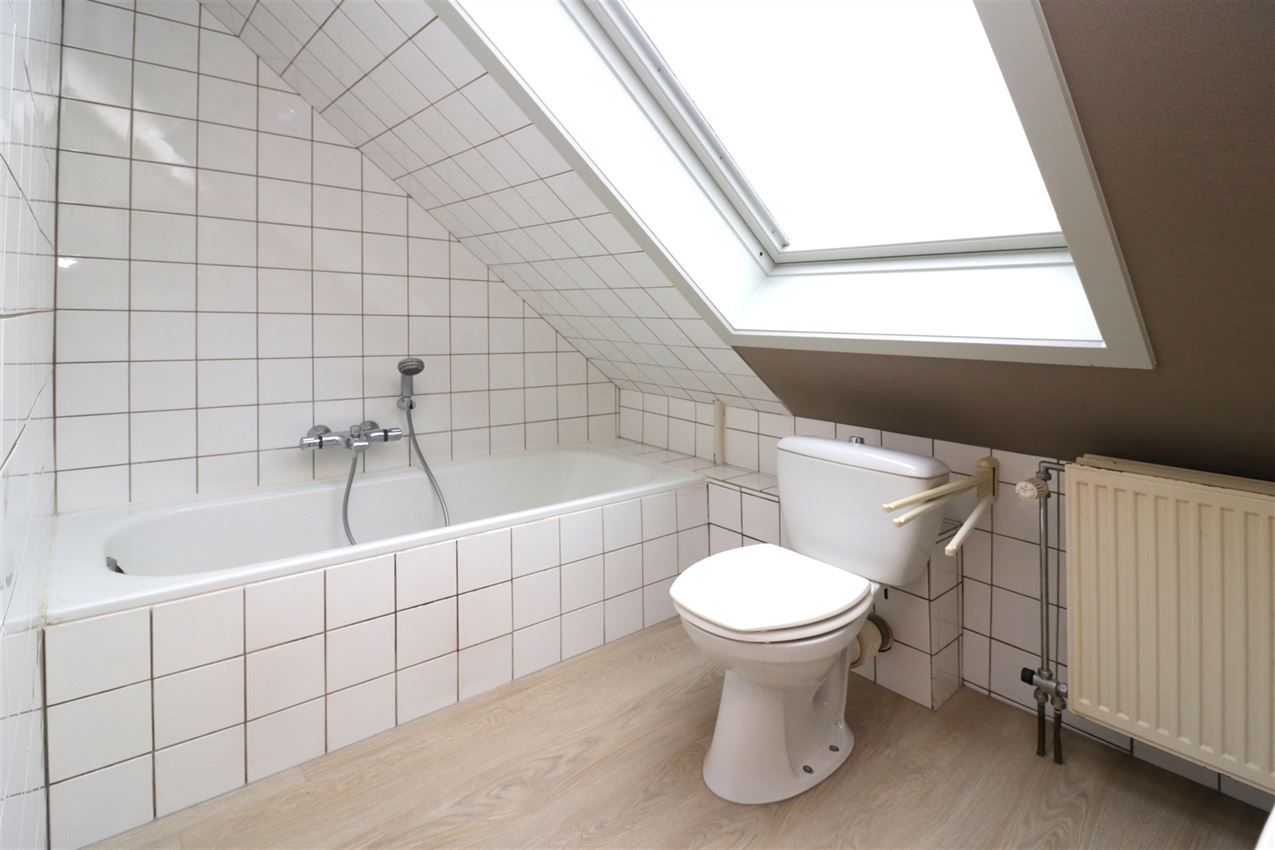 Centraal gelegen appartement met 3 slpk., garage en terras foto 27