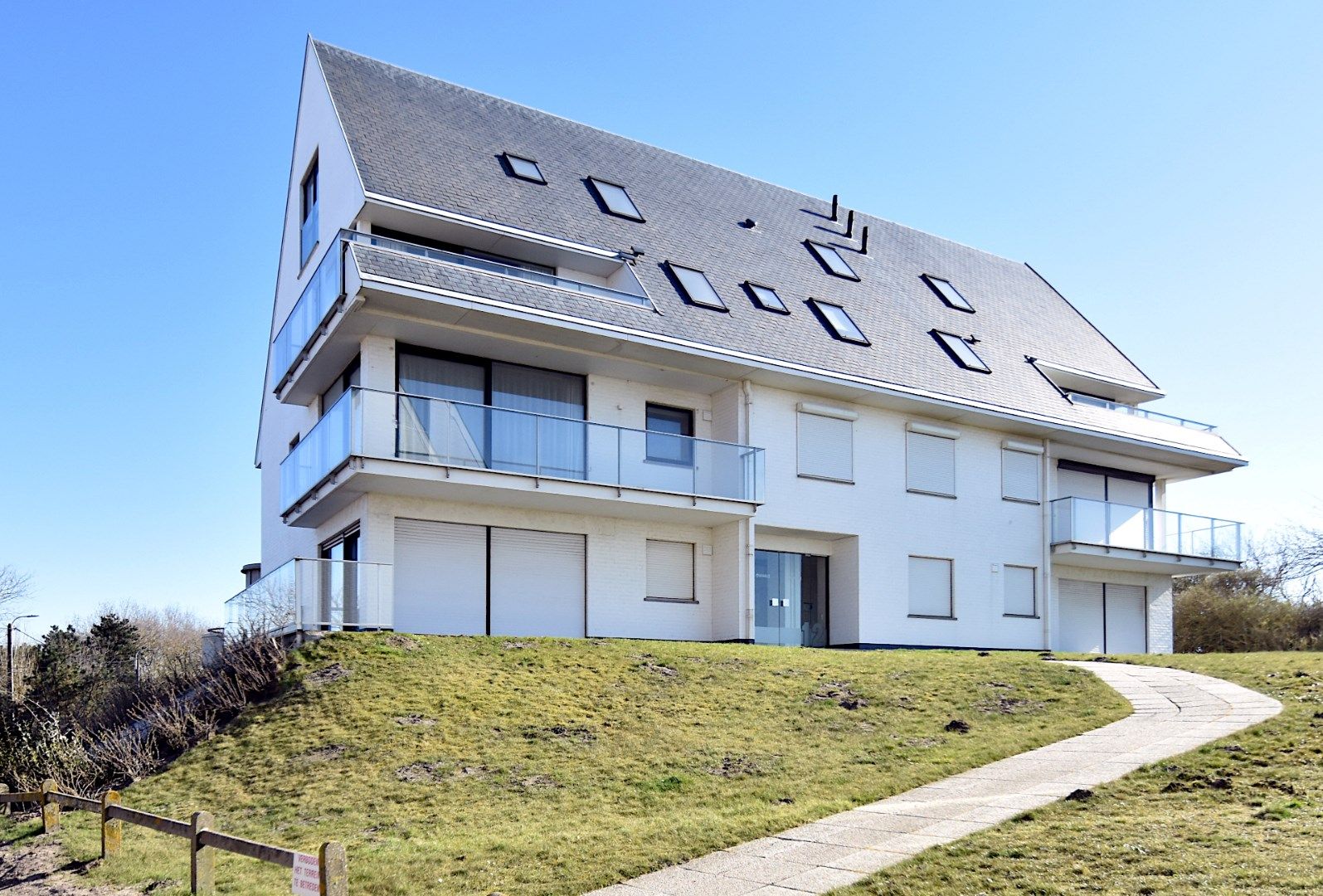 Lichtrijk appartement met adembenemend zicht op de duinen en de zee foto 4