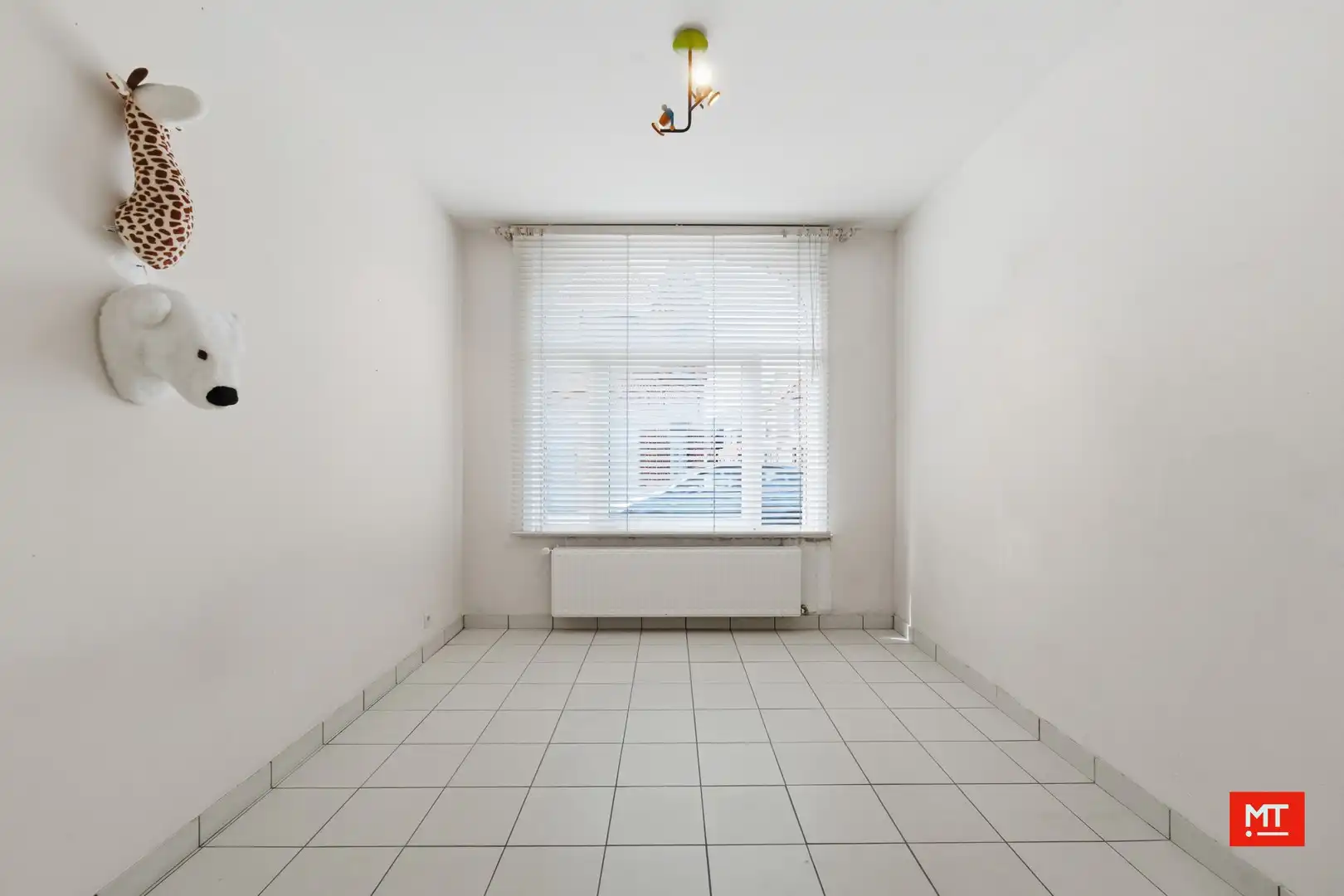 Gelijkvloers twee-slaapkamerappartement met garage te koop in het centrum van Langemark foto 9