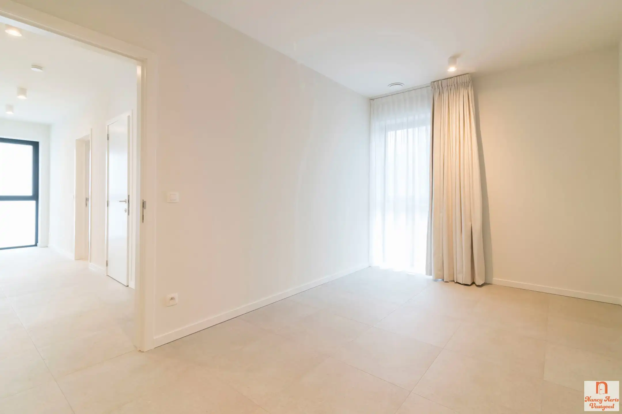Instapklaar appartement met tuin en carport op toplocatie foto 13