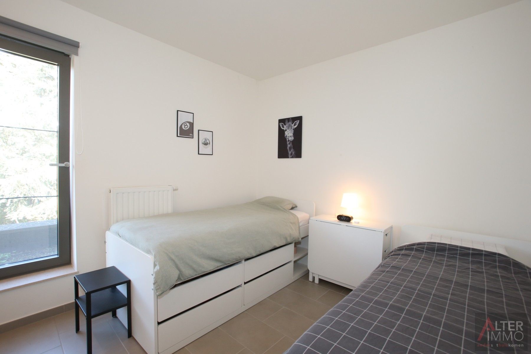 Instapklaar, centraal gelegen 2-slaapkamer appartement met terras en ondergrondse parking! foto 14