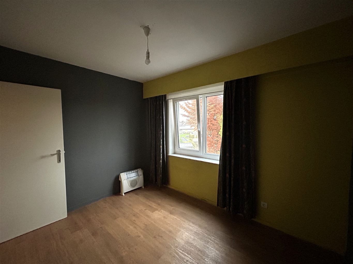 Ruim appartement met 3 slaapkamers en garagebox, gelegen in een rustige, kindvriendelijke omgeving. foto 5