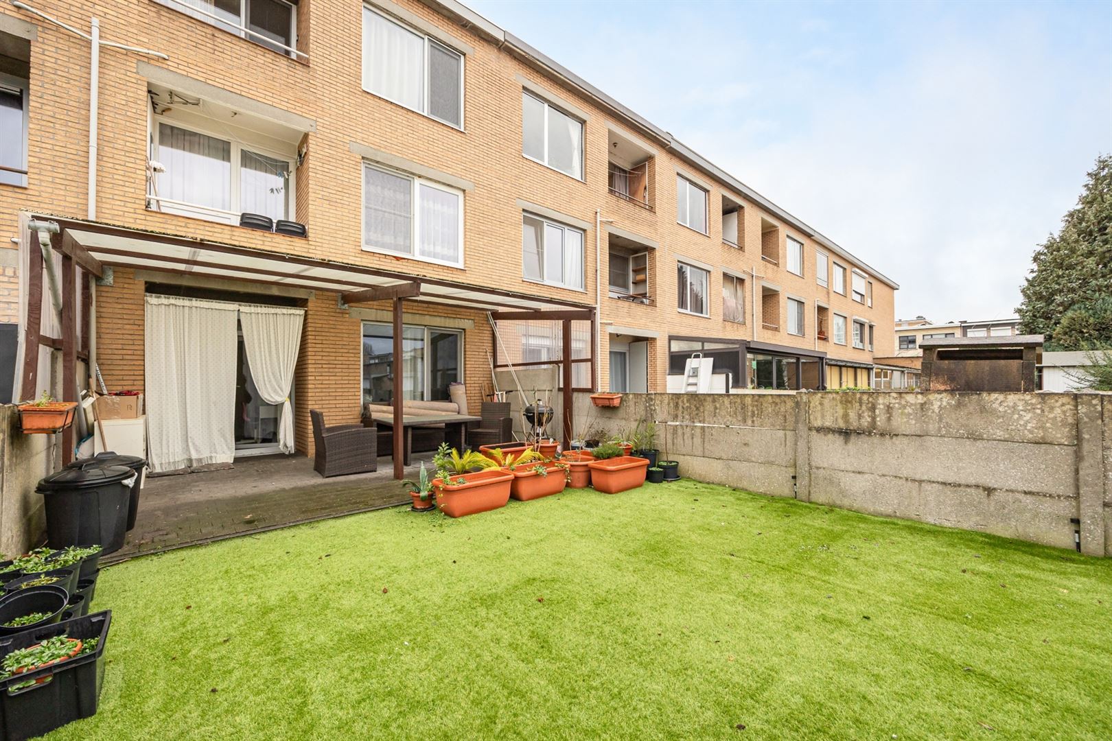 Gelijkvloers appartement met leuke tuin en garagebox foto 10