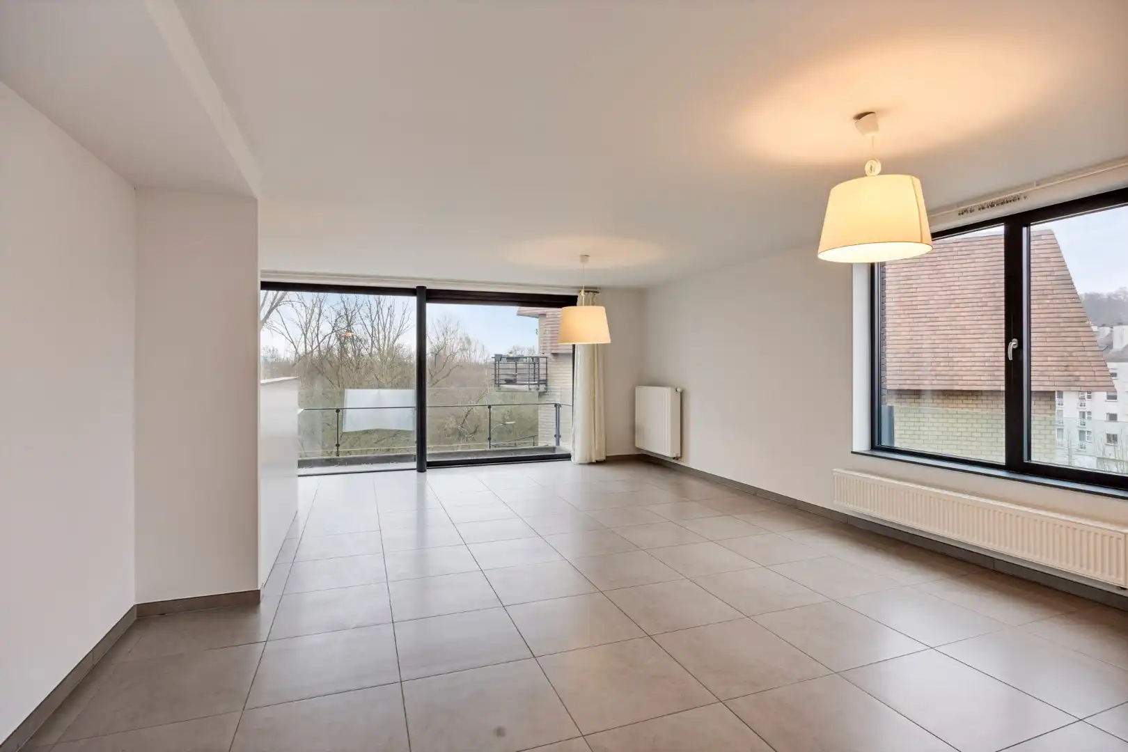 Ruim en lichtrijk appartement met 2 slaapkamers, terras en autostaanplaats vlakbij autostrade - EPC 108 kWh/m² foto 6