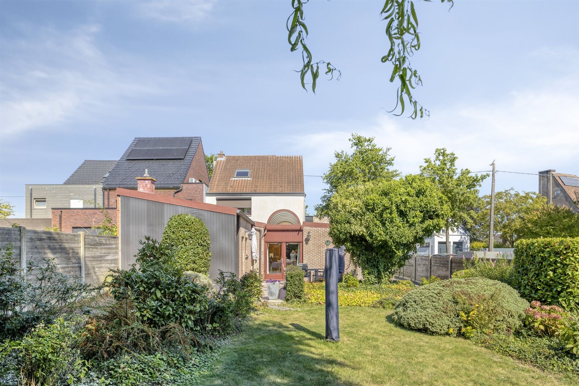 Ruime gezinswoning met zonnige tuin en garage in hartje Merchtem foto 13