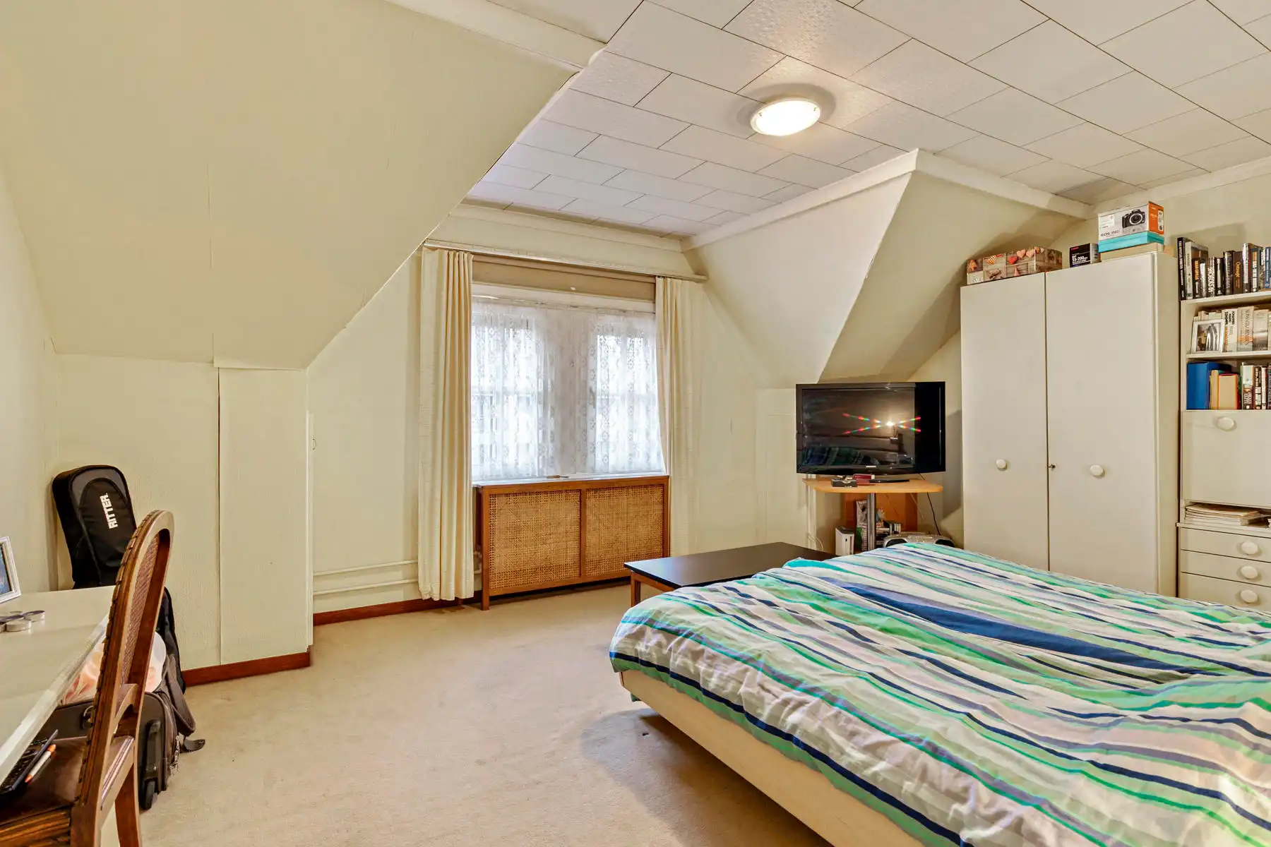 In de dorpskern van Neeroeteren gelegen halfvrijstaande woning met 2 slaapkamers. foto 19