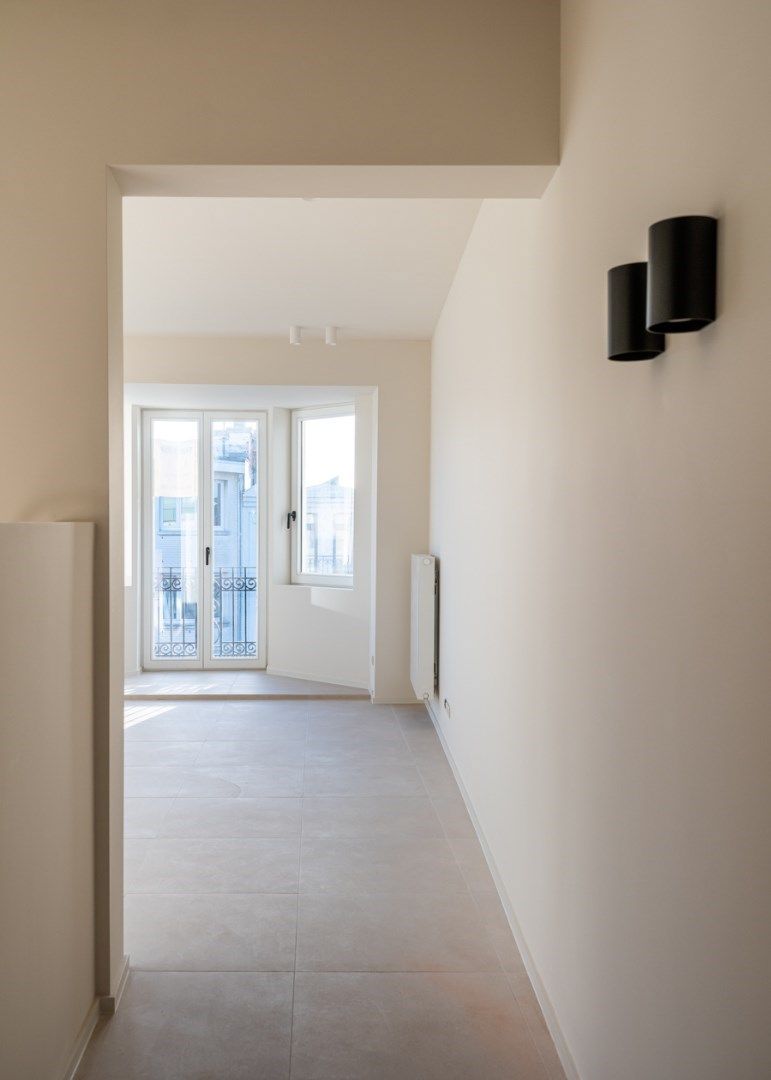Stijlvol  gerenoveerd 2 slaapkamer appartement op de markt in de Panne foto 11