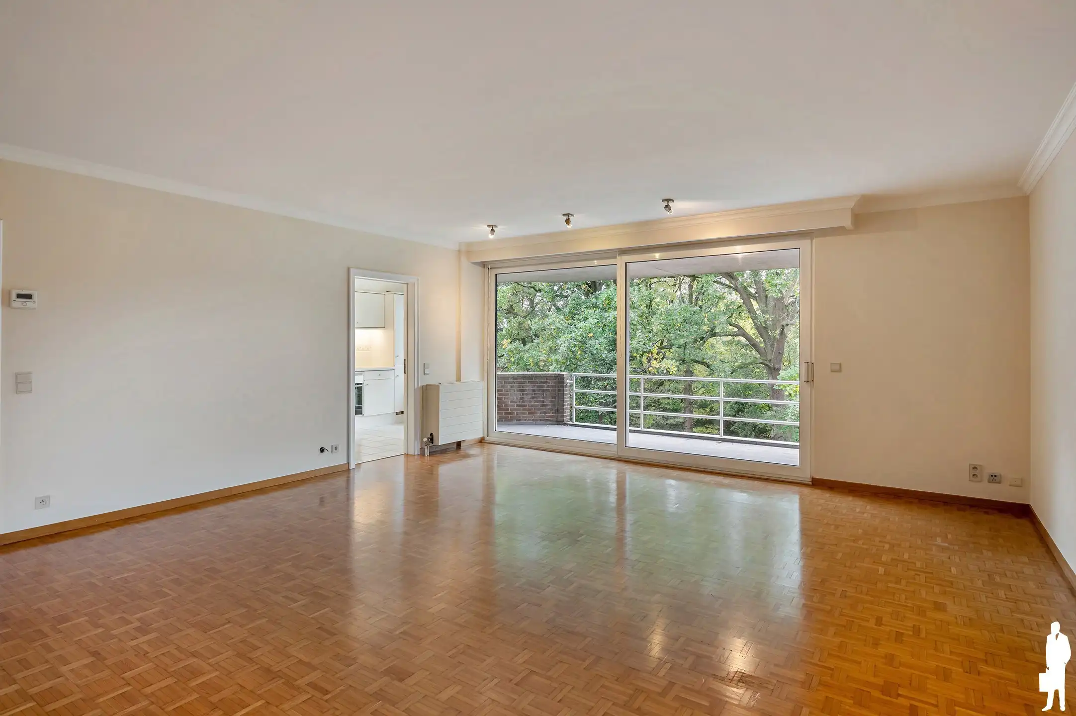 In het groen gelegen appartement van 100m2 met 2 slaapkamers, overdekt terras en parking foto 2