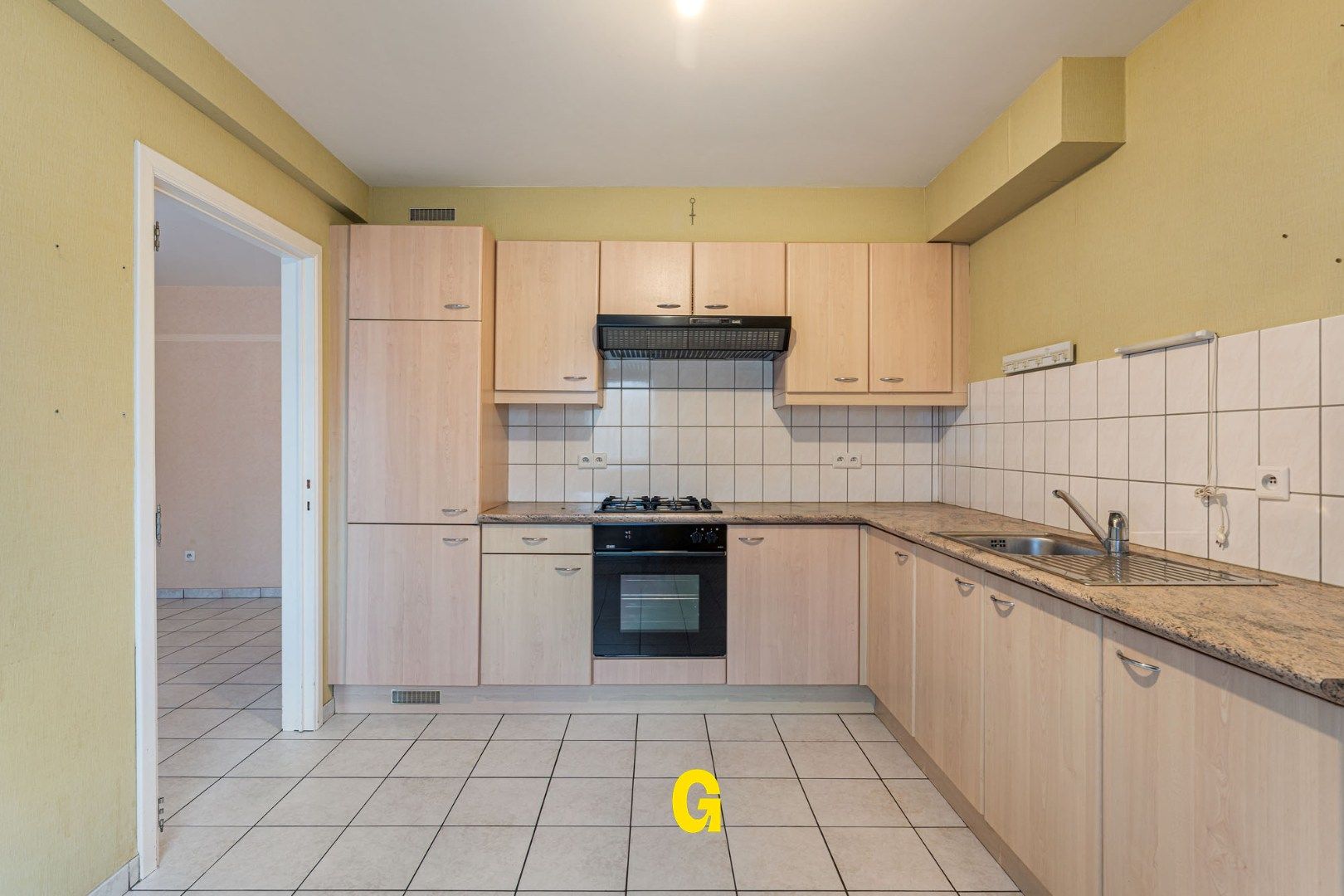 Degelijk (rolstoelvriendelijk) gelijkvoersappartement met terras uitgevend op de tuin, afsluitbare garage en berging foto 13