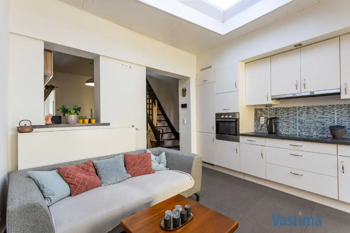 Energiezuinige en instapklare starterswoning met 2 slaapkamers in hartje Erembodegem foto 4