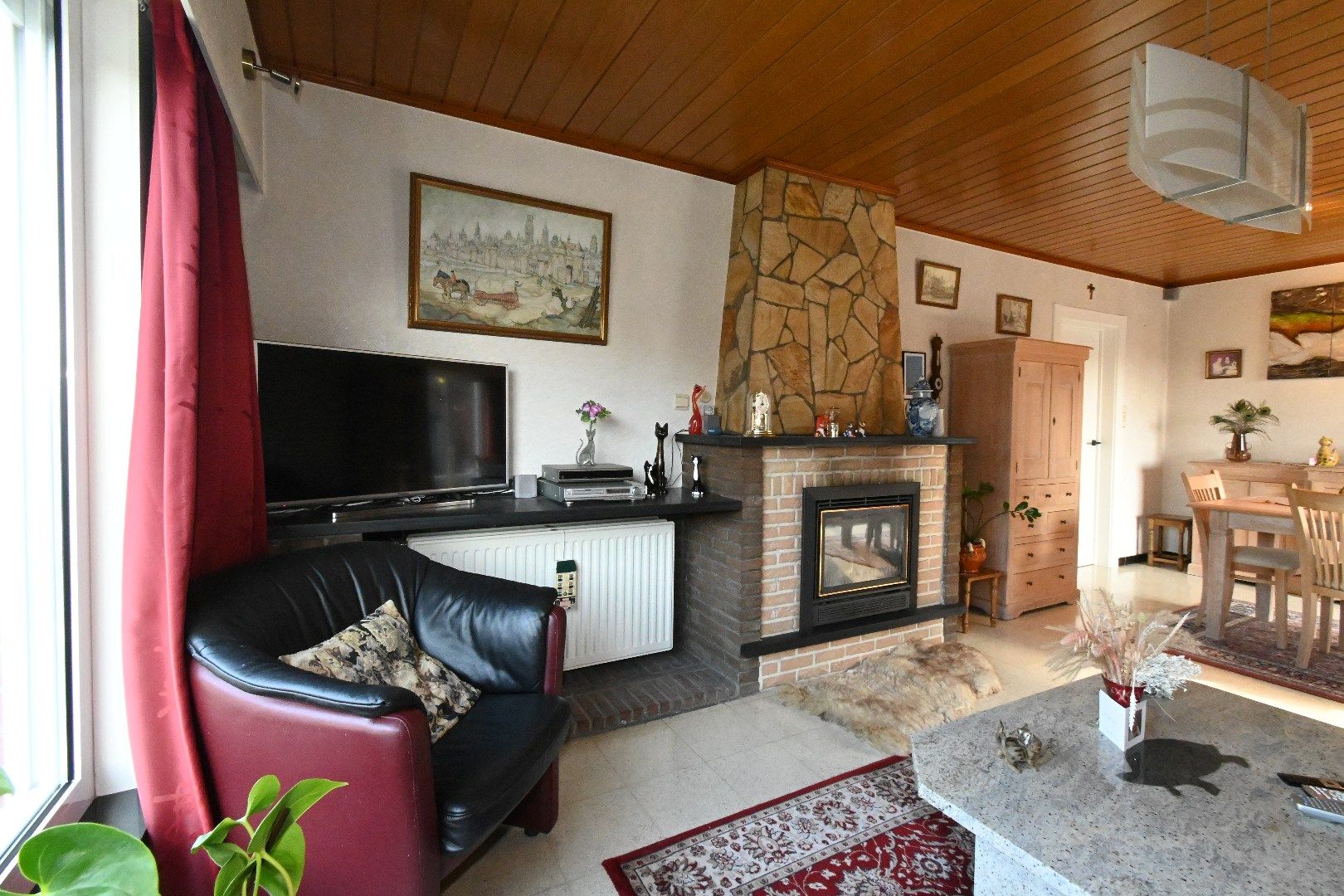 Alleenstaande woning met carport en tuin foto 7