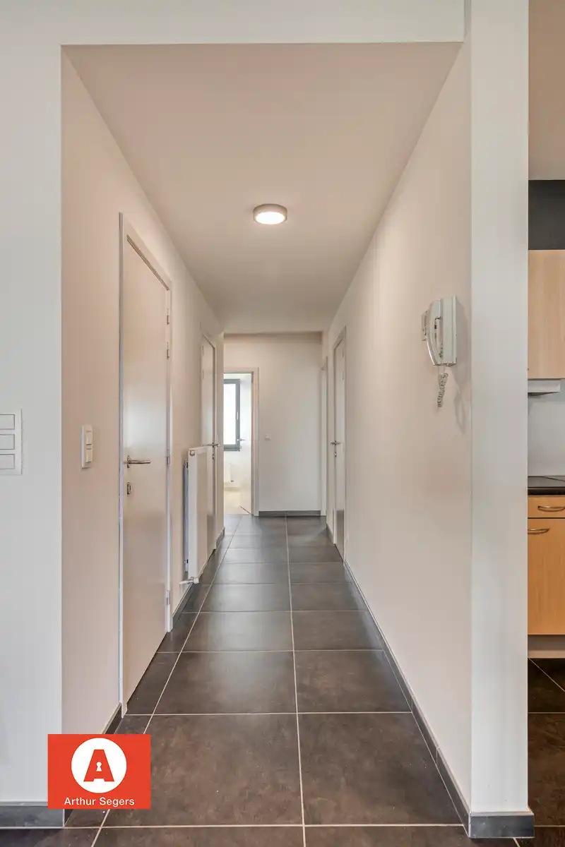 Energiezuinig gelijkvloers appartement met garage foto 12