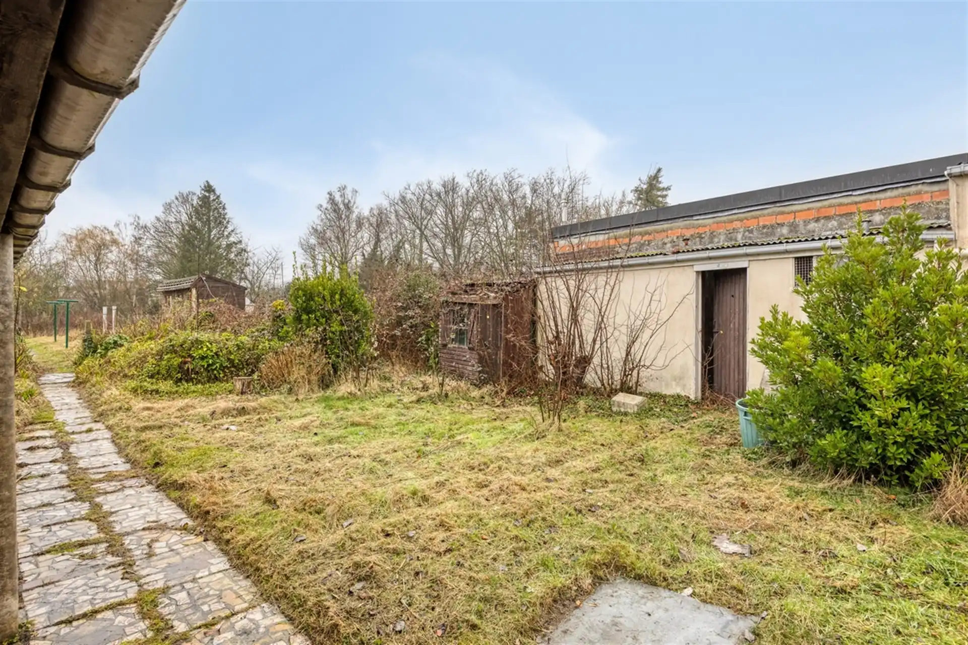 Te renoveren woning met prachtige tuin foto 21