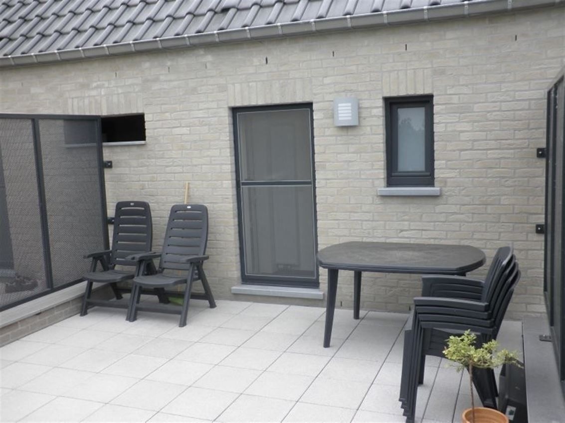 Duplex met 2 slpk., groot terras en twee autostplts  foto 3