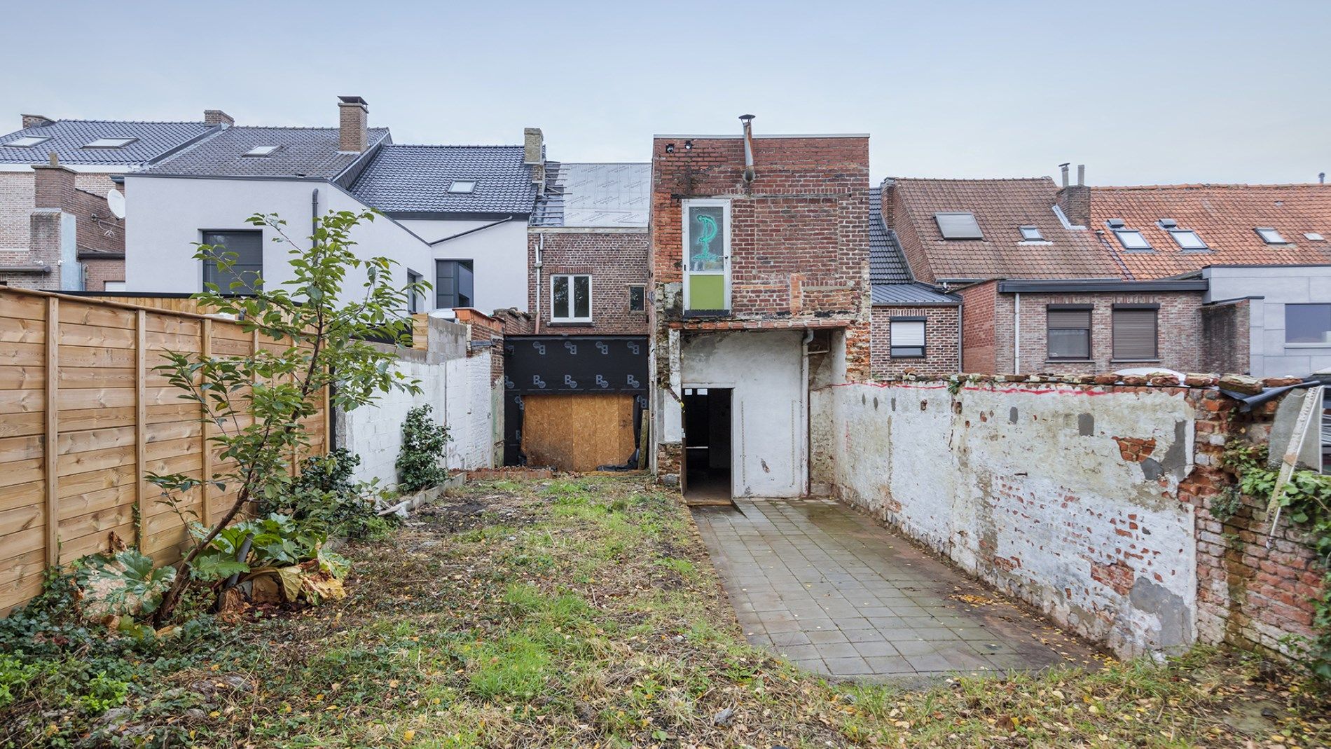 Af te werken rijwoning in centrum Tienen foto 7