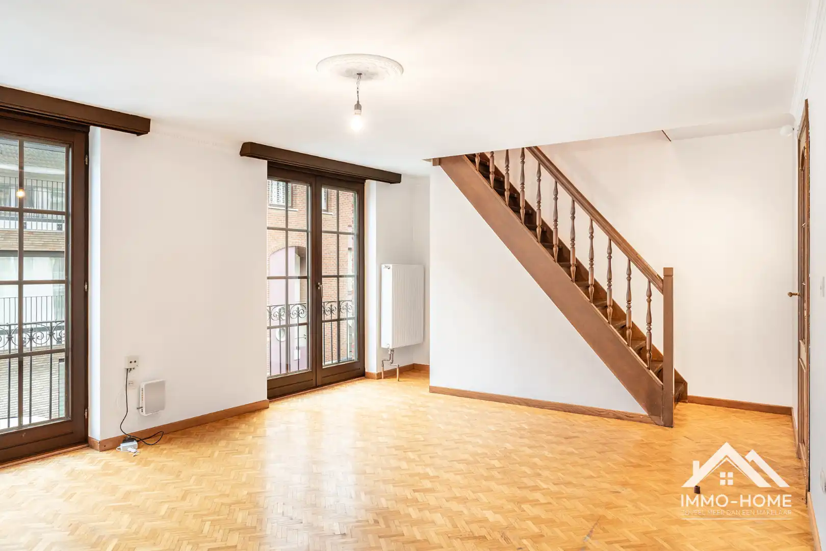 Karaktervol opbrengsteigendom in hartje Lokeren met studio en duplex appartement! foto 14