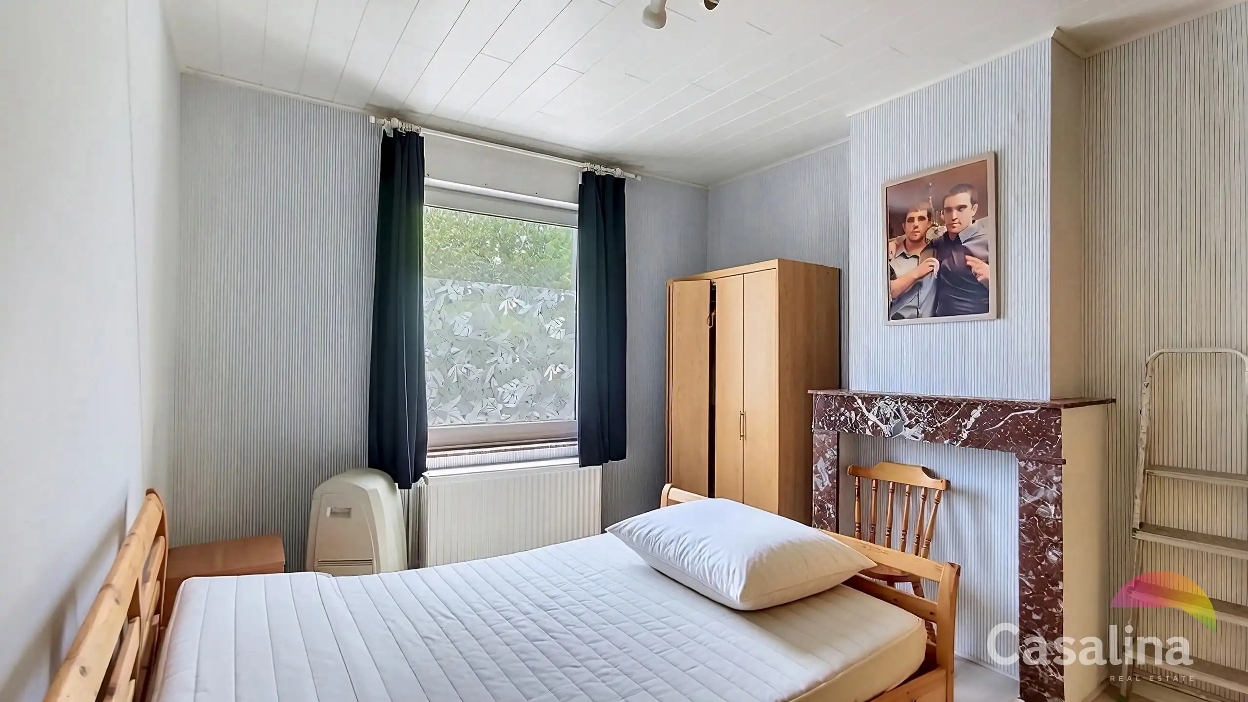 Bel-etagewoning met garage en tuin om op te frissen foto 14