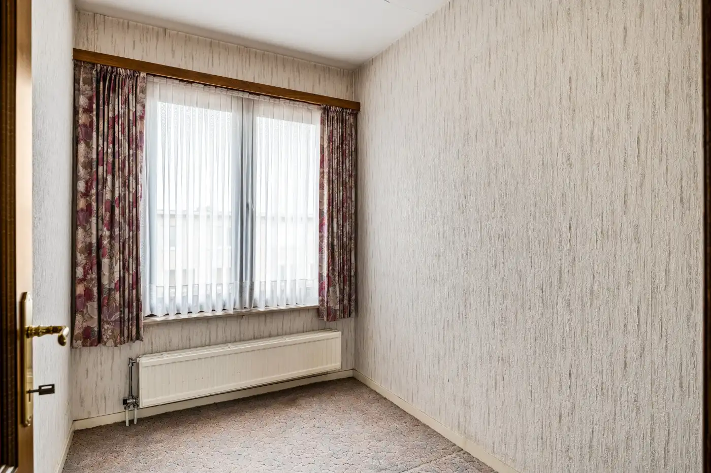 Centraal gelegen beletage-woning met 3 slpk., inpandige garage en tuin foto 12