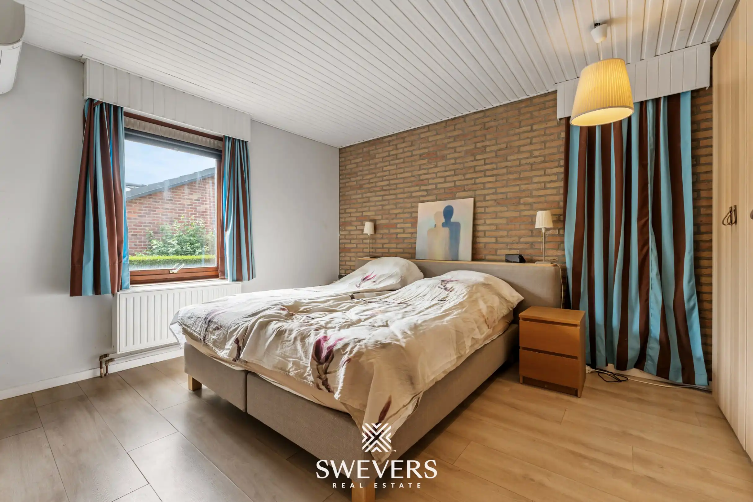 Uitzonderlijk ruime kangoeroewoning met 7 slpk te Hasselt foto 7