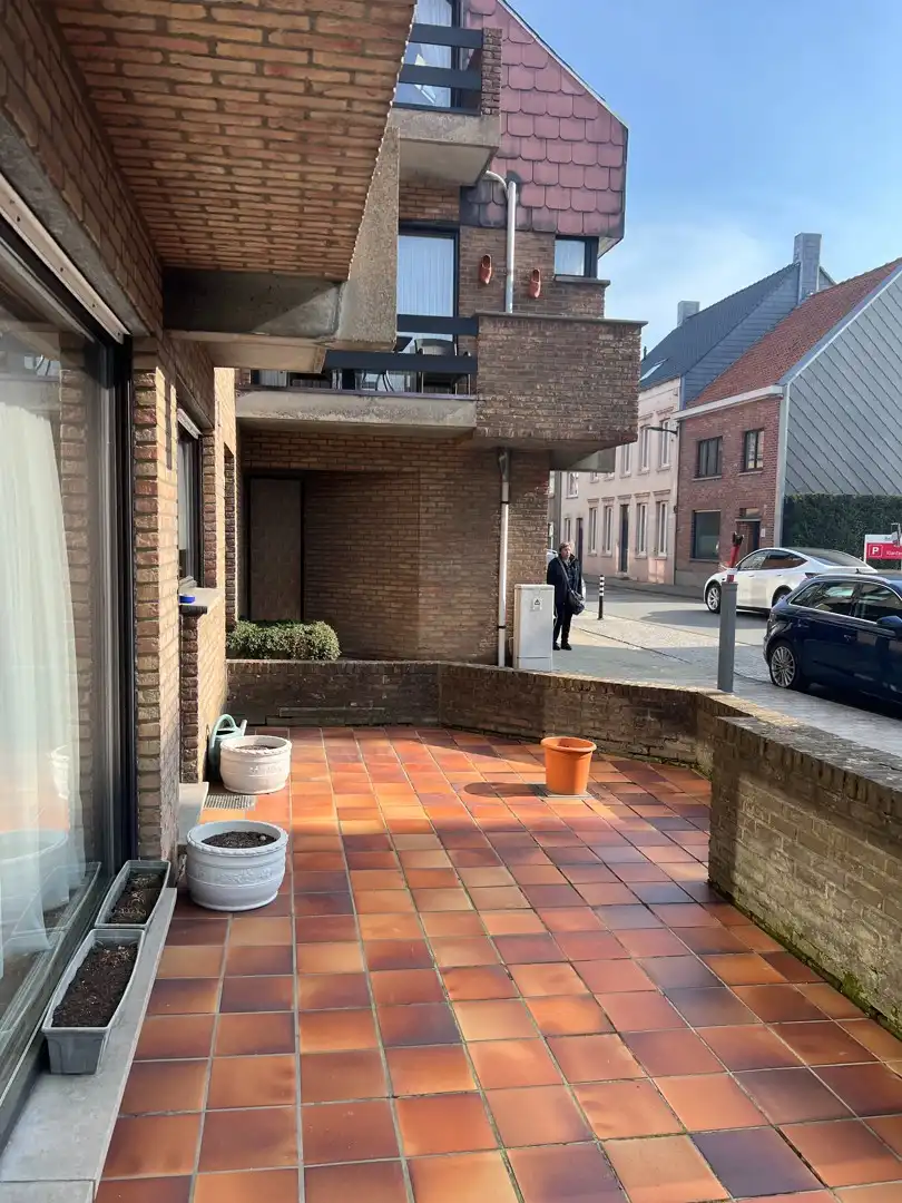 Gelijkvkoers appartement op de markt van Oudenburg foto 10