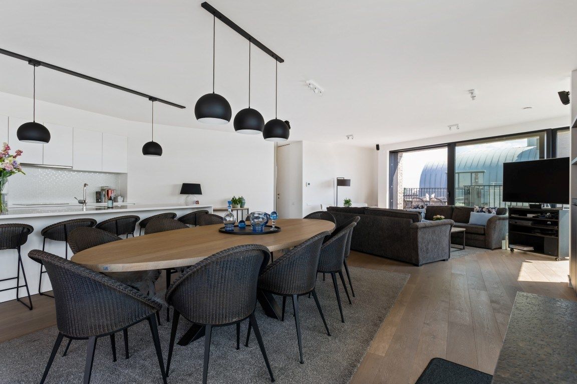 Mooi gelegen appartement langsheen het water met terrassen en parkeerplaats te Gent foto 4