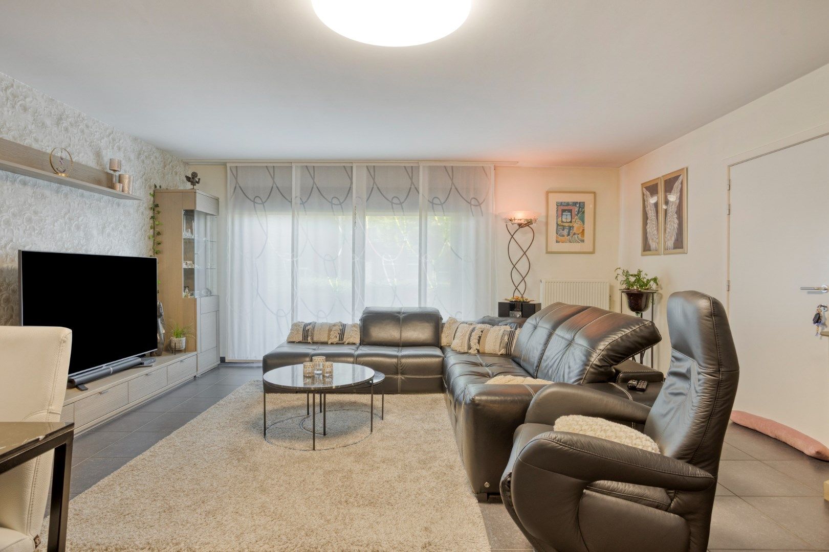 Verzorgd gelijkvloers appartement met tuin vlakbij het centrum foto 4