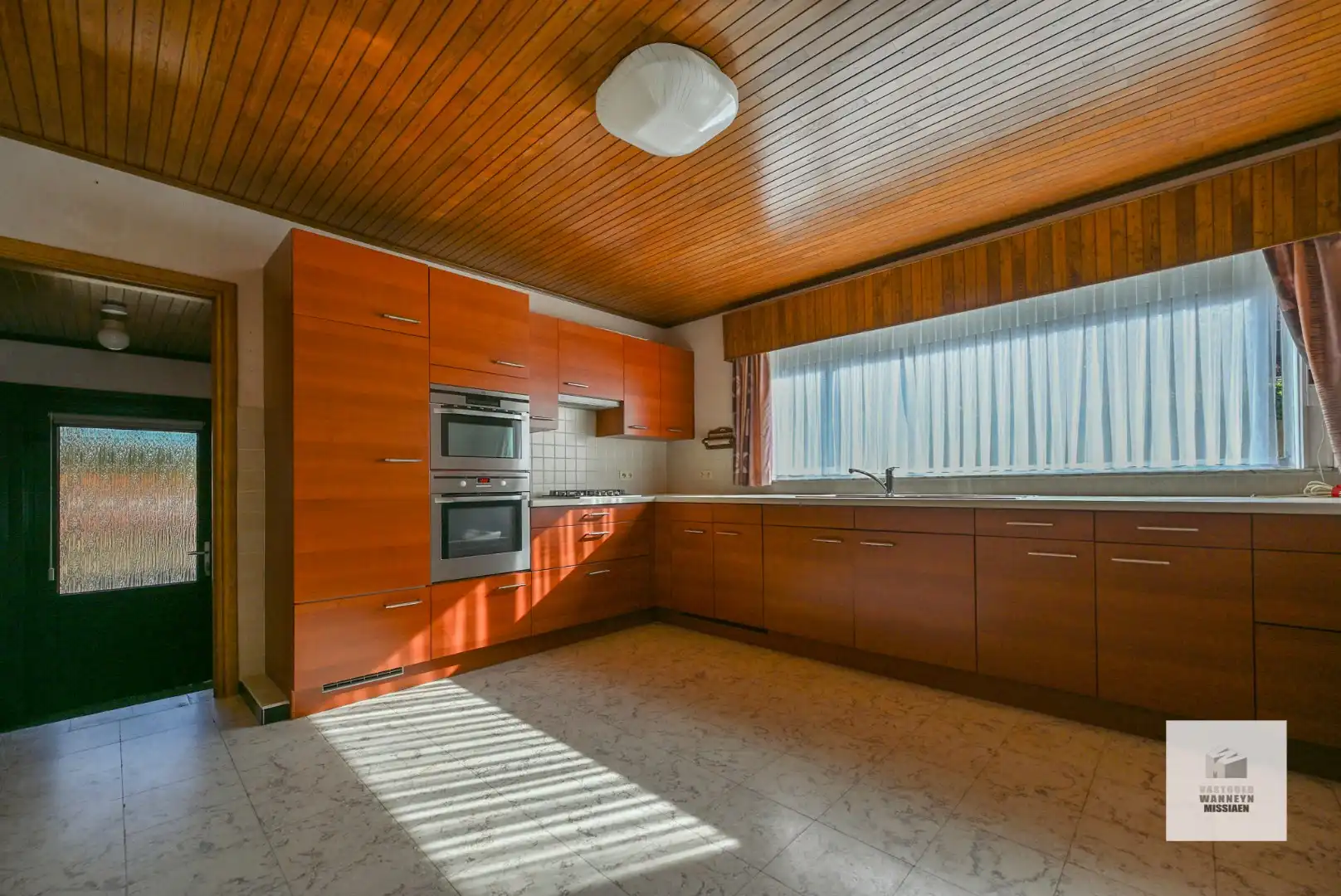 Te renoveren gelijkvloerse woning met  3slpk, garage, tuin op 1290m2 foto 12