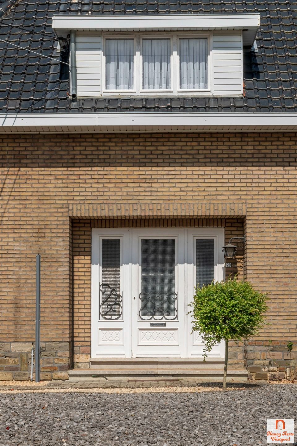 Sfeervolle jaren ’60-woning met grote tuin in rustige straat foto 36