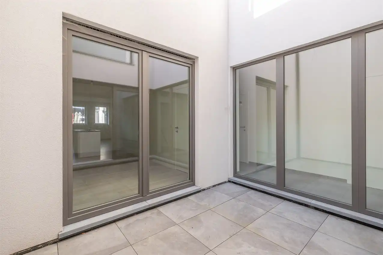 Nieuwbouwappartement met 1 slpk, autostaanplaats en terras foto 15