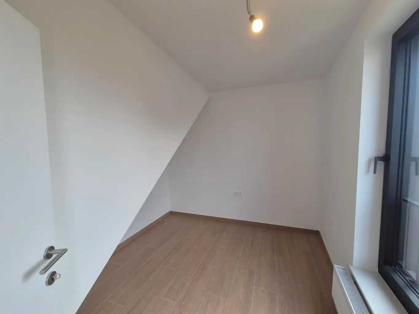 Nieuwbouw duplex met 2 slpks, bureel, terras en kelder foto 9