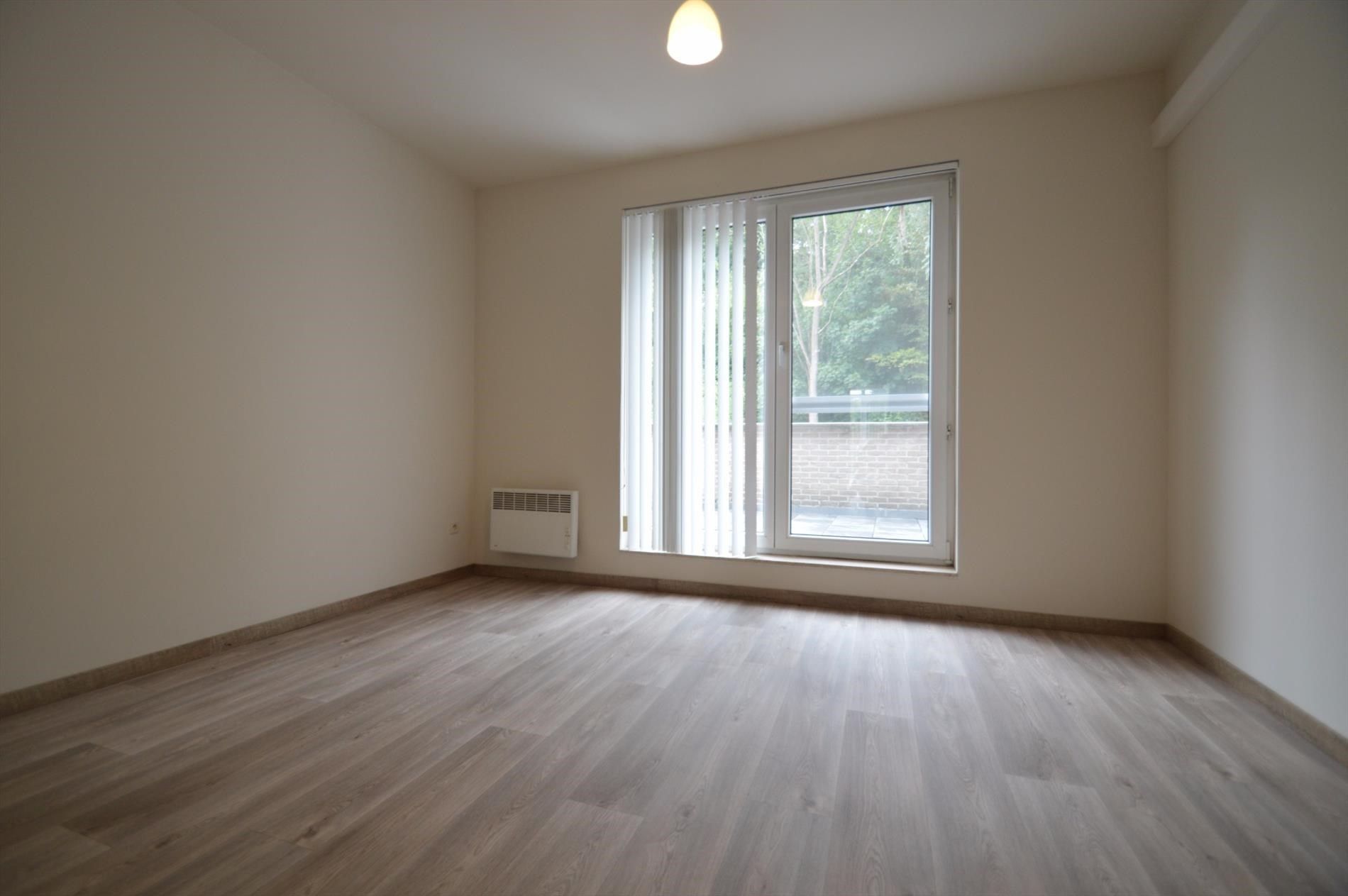 Netjes opgefrist appartement met 2 slk, terras en garage in centrum v Bilzen foto 9