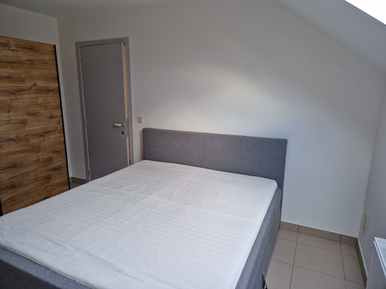 App. centrum Bilzen, rustige ligging, 2 slpk, parkeeruimte, terrasje. foto 15