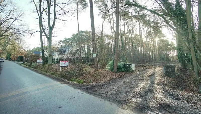 Residentieel gelegen bouwgrond van 15 are voor open bebouwing nabij golf- en meerdomein foto 3