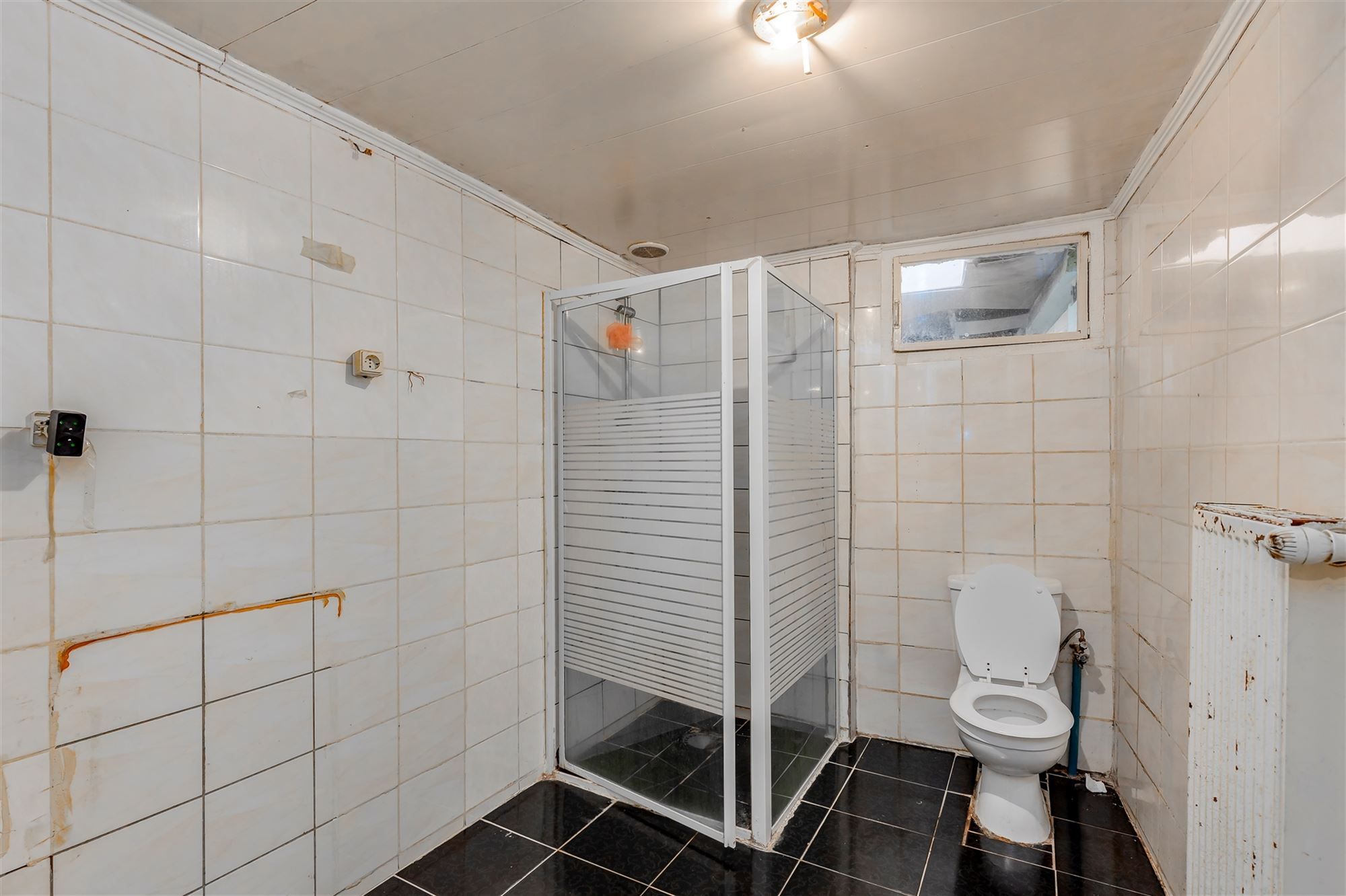 Te renoveren woning 2 slpk met garage foto 10