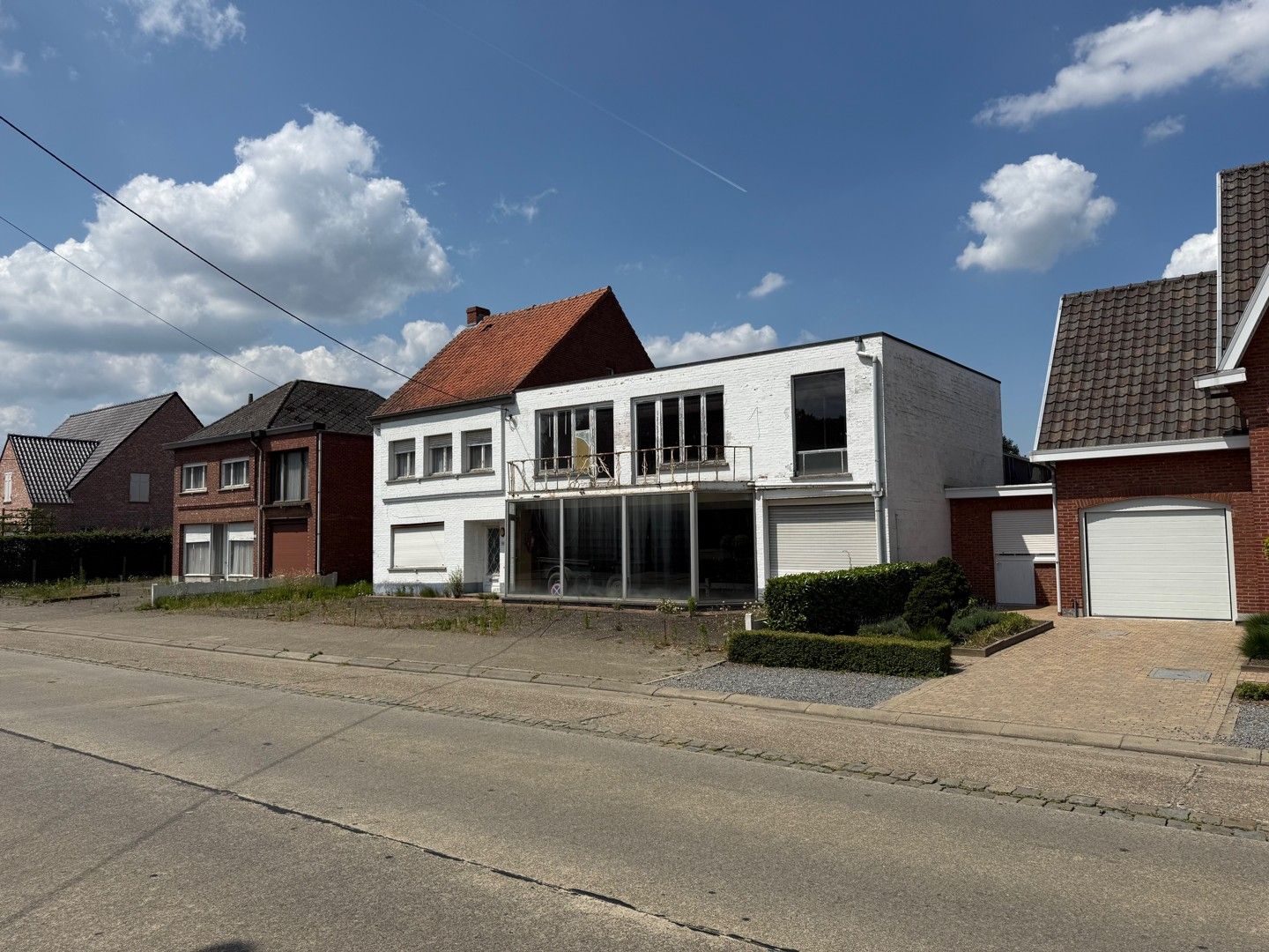 Woning met loods en voormalige showroom foto 3