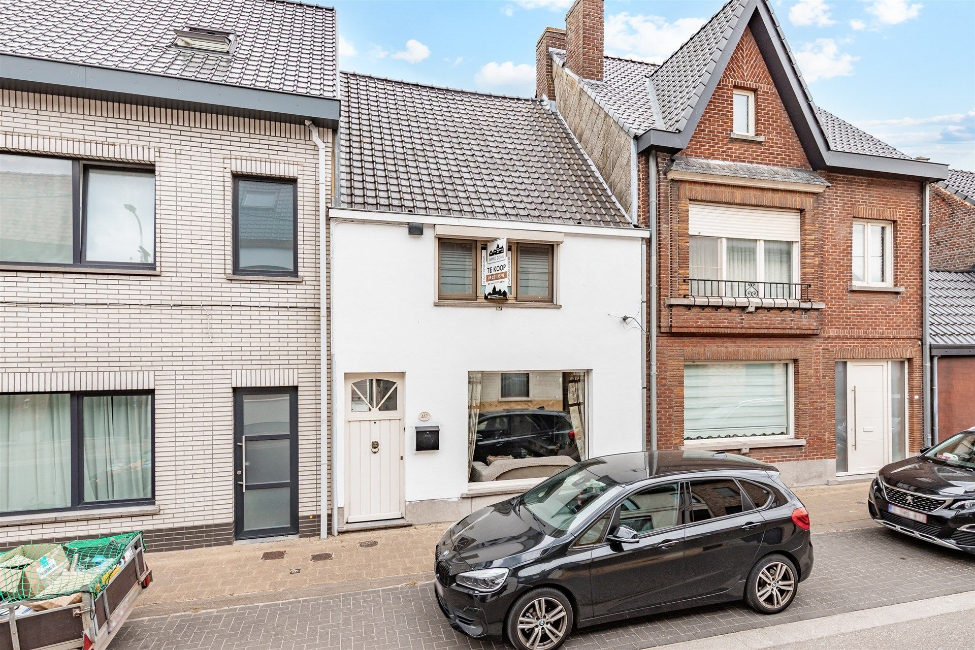Instapklare woning met 2 slaapkamer en gezellige koer foto {{pictureIndex}}